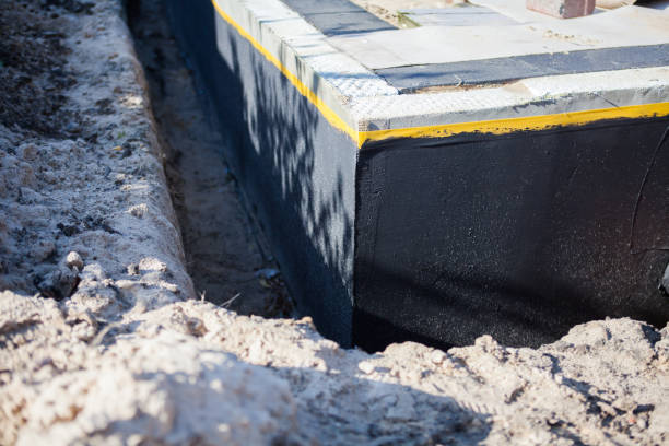 Professional Waterproofing technician working in Metamora, IN